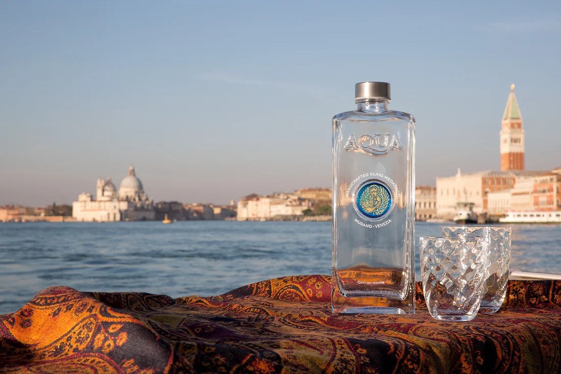 Glass Bottle with Light Blue Murano Glass Medallion with Gold Lion.