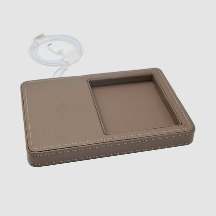 Svuotatasche e caricabatterie Magsafe per iPhone