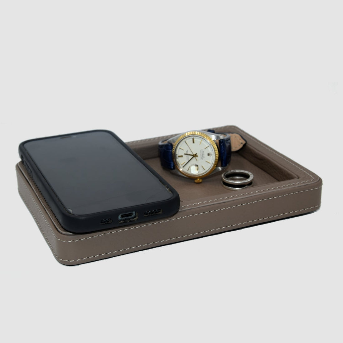 Svuotatasche e caricabatterie Magsafe per iPhone
