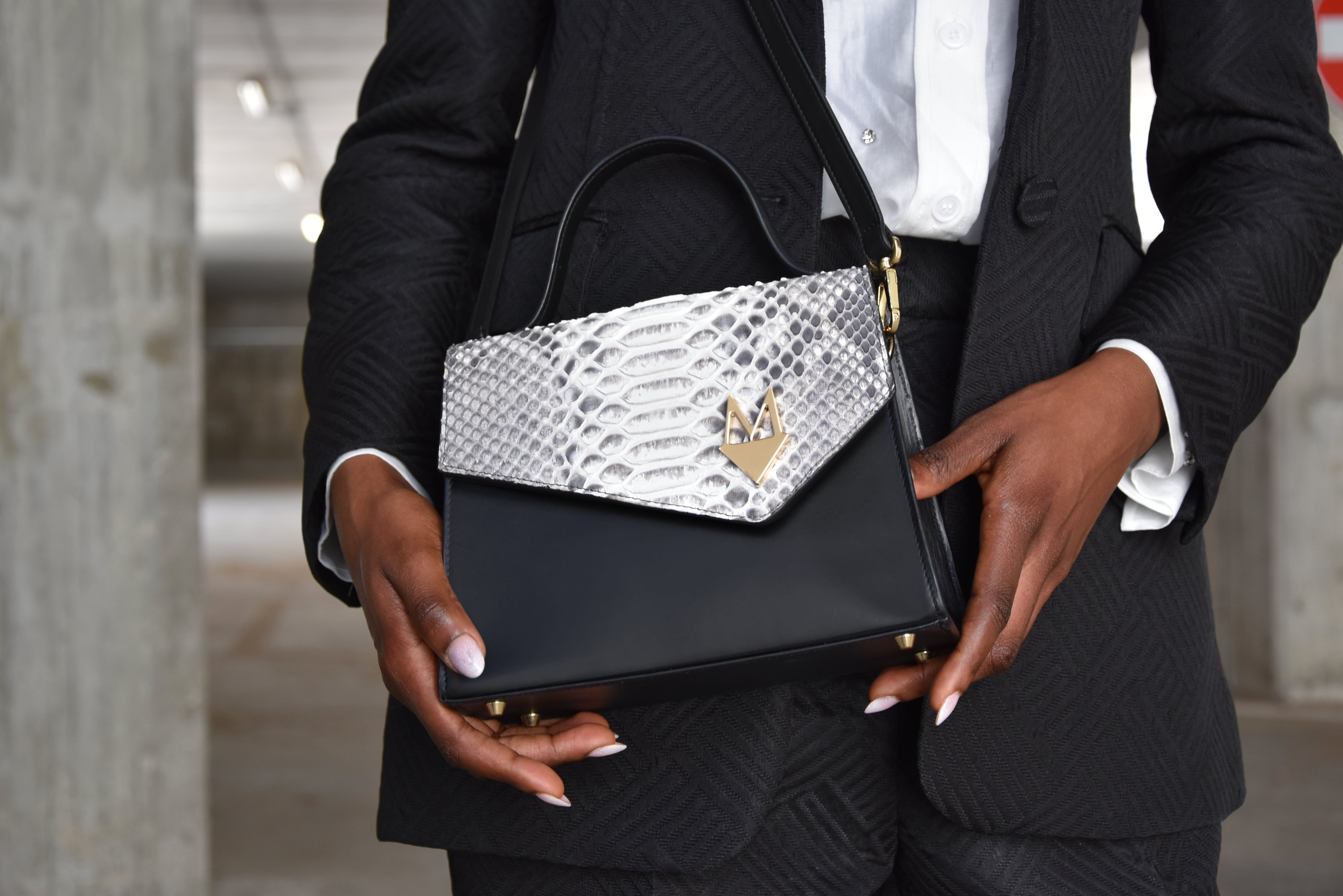 Borsa "Eccelsa" in vera pelle di Pitone Bianco e Nero